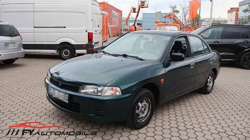 Second-hand Mitsubishi Lancer 75 CP (55 kW) 1998 Verde Berlinǎ