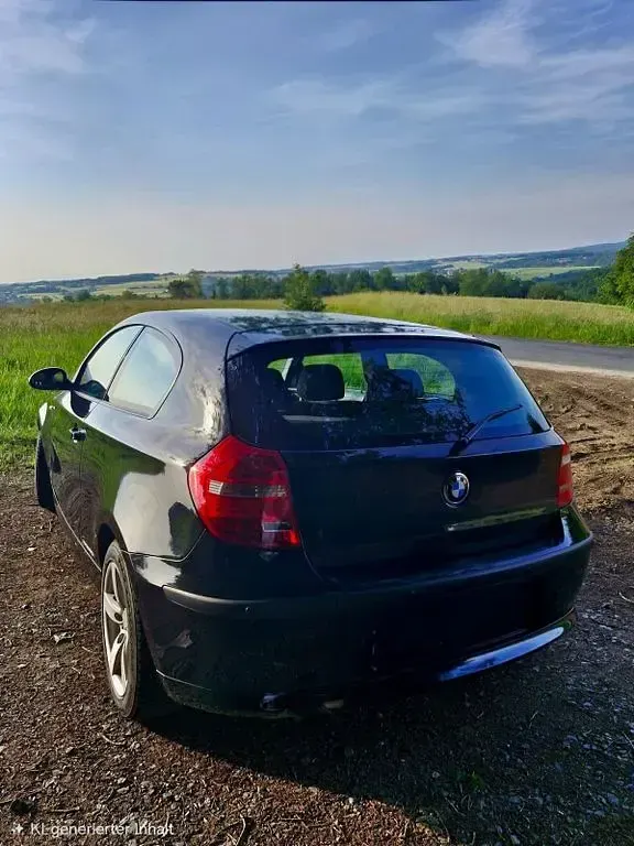 Gebraucht BMW 116 122 PS (89 kW) 2009 Schwarz Kleinwagen