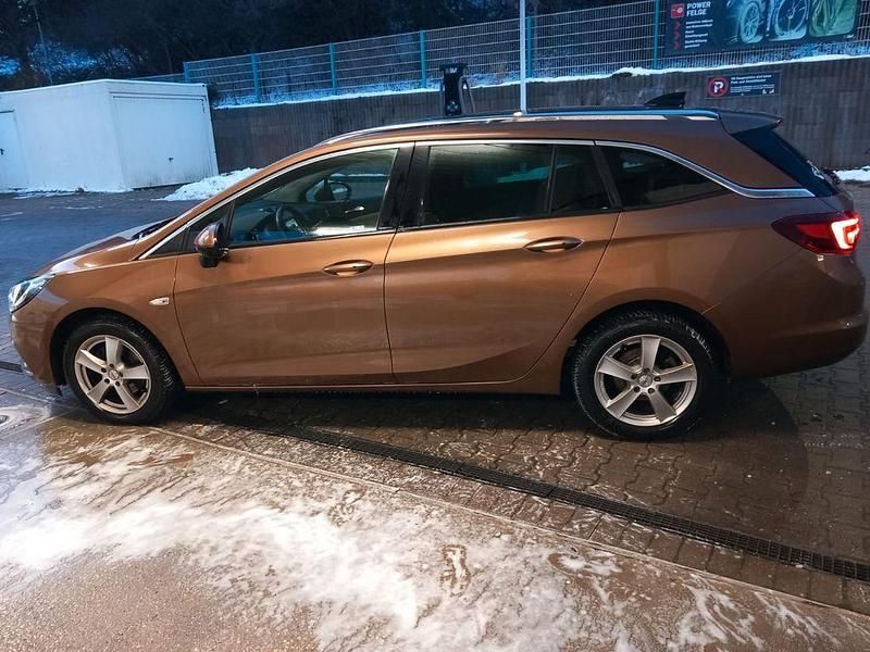 Braun Gebraucht 2016 Opel Astra Eco Kombi | 11.480 € (Fairer Preis) - Bild 1/4