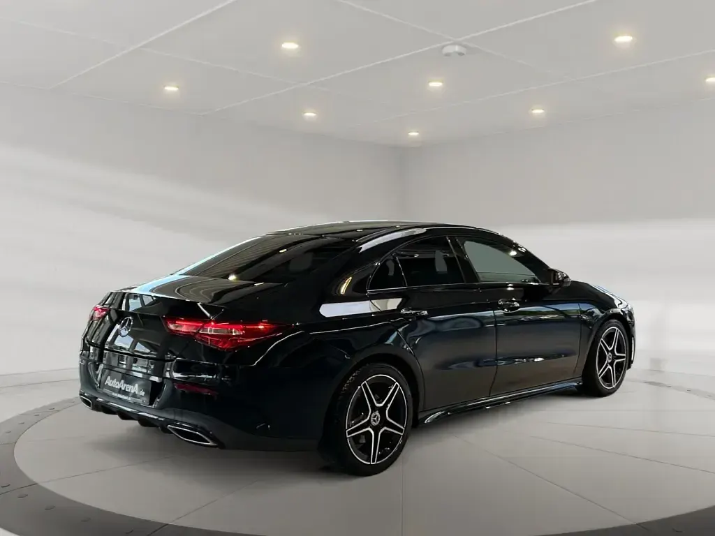 Gebraucht Mercedes CLA200 AMG 150 PS (110 kW) 2020 Metalliclack kosmosschwarz Coupé