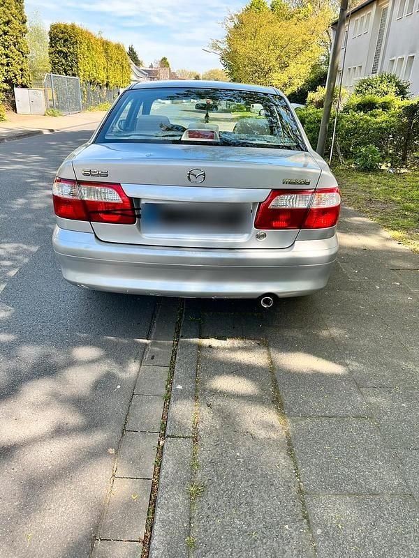 Second-hand Mazda 626 115 CP (84 kW) 2000 Argintiu Berlinǎ