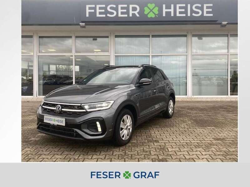 Indiumgrau metallic schwarz Gebraucht 2024 VW T-Roc R-line SUV | 28.890 € (Superpreis) - Bild 1/4