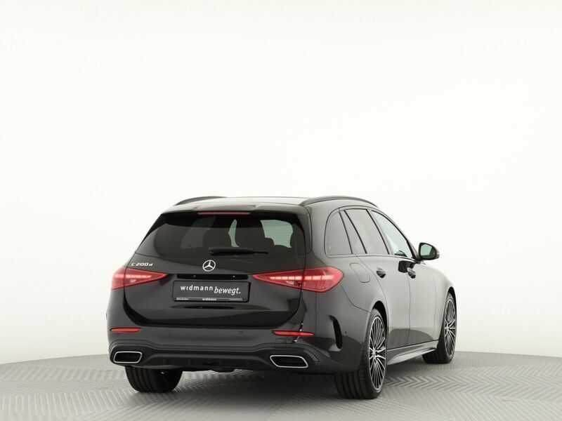 Gebraucht Mercedes C200 AMG 163 PS (119 kW) 2024 Metalliclack obsidianschwarz Kombi