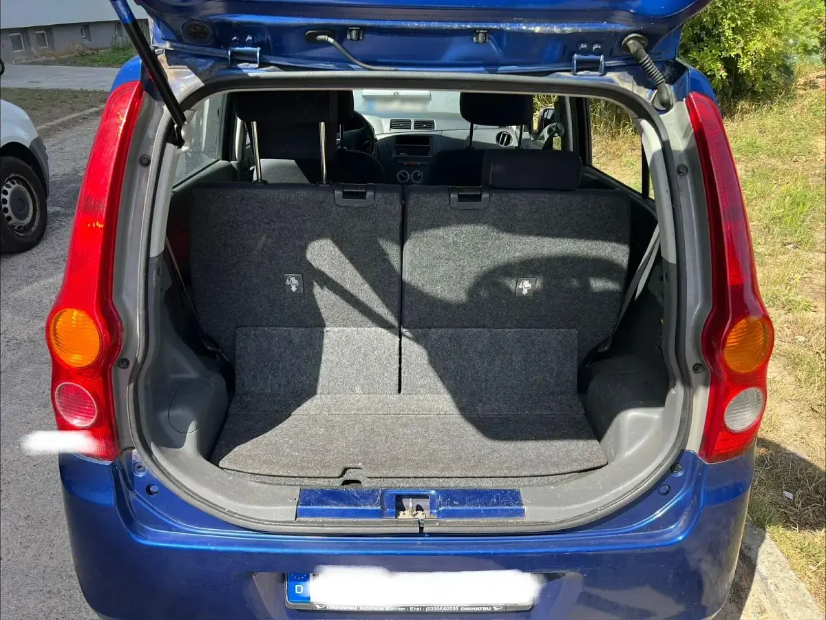 Gebraucht Daihatsu Cuore 69 PS (50 kW) 2009 Blau Kleinwagen