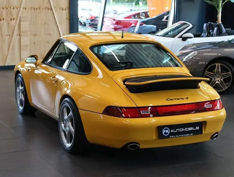 Gebraucht Porsche 911 Carrera 4 272 PS (200 kW) 1995 Gelb Coupé