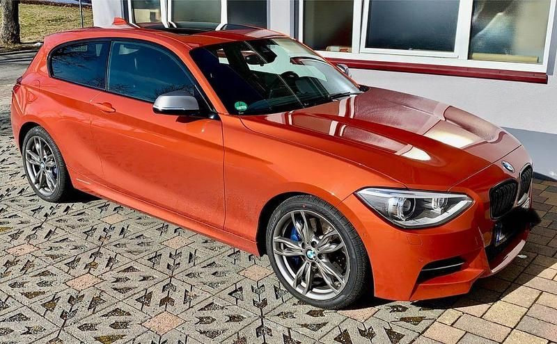 Usata BMW M135 Performance 320 CV (235 kW) 2013 Arancione Utilitaria