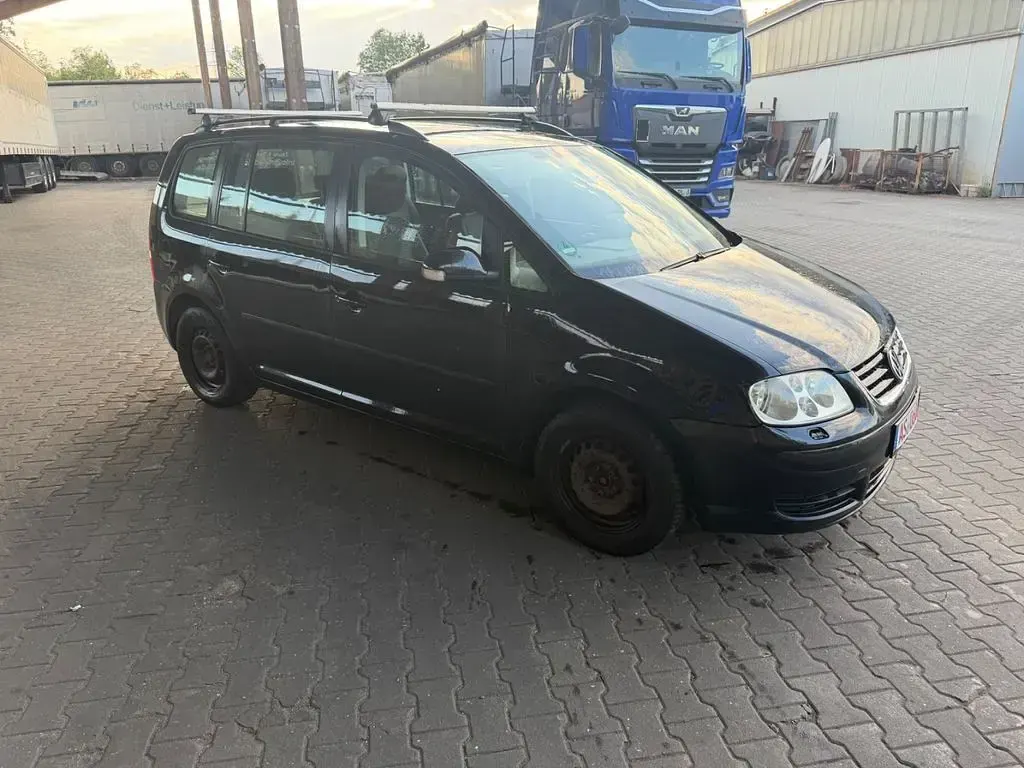 Gebraucht VW Touran Highline 101 PS (74 kW) 2004 Schwarz Van / Kleinbus