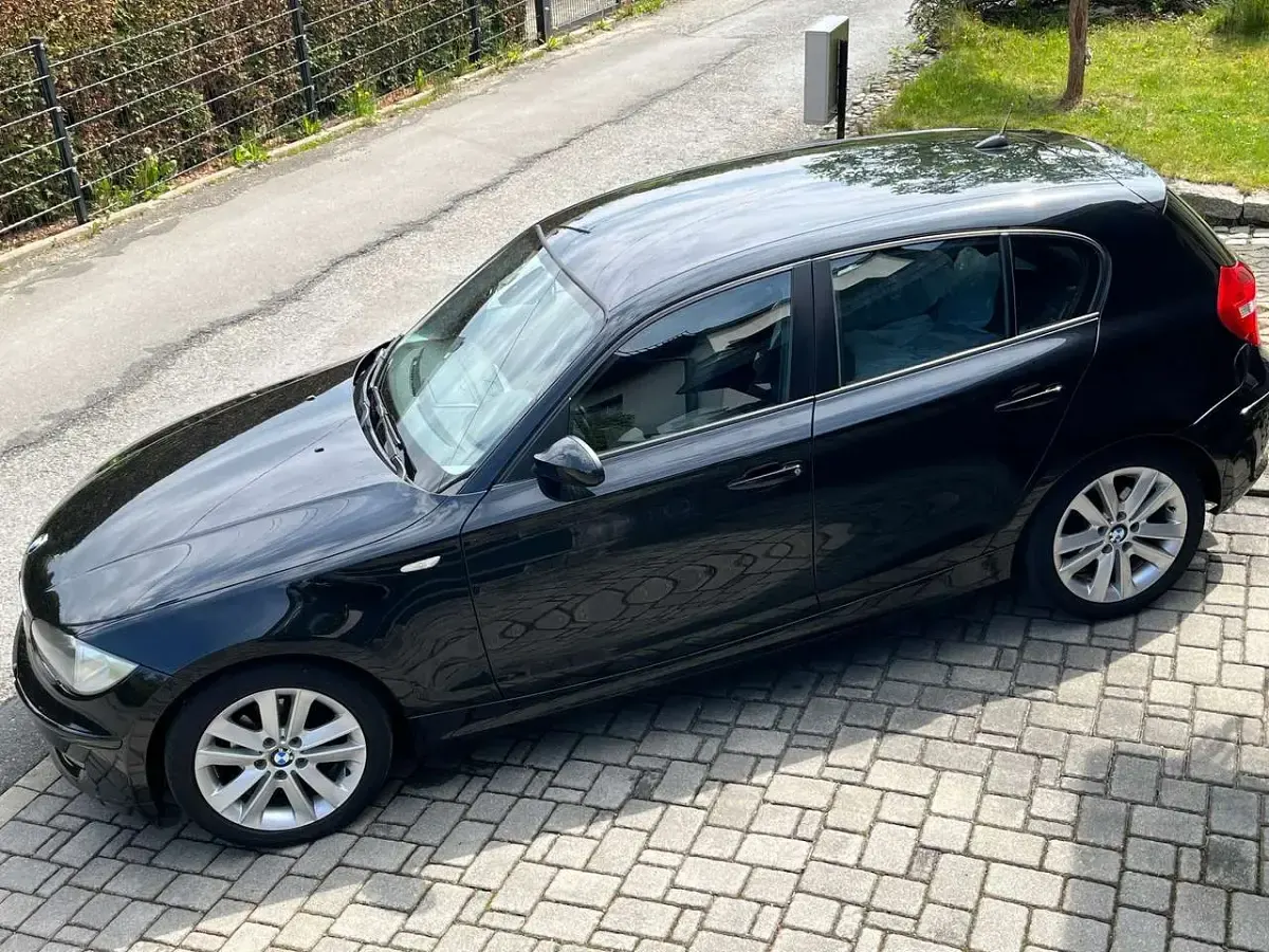 Używany BMW 116 122 KM (89 kW) 2009 Czarny Hatchback