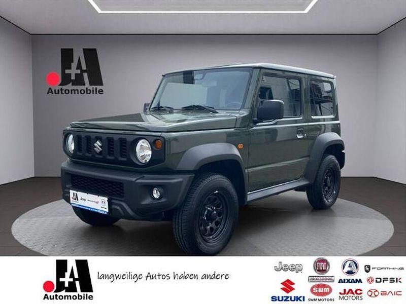 Solid green jungle green Gebraucht 2018 Suzuki Jimny Comfort SUV | 27.499 € (Fairer Preis) - Bild 1/4