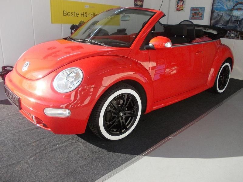 Sundown orange Gebraucht 2004 VW Beetle Highline Cabrio | 7.900 € - Bild 1/4