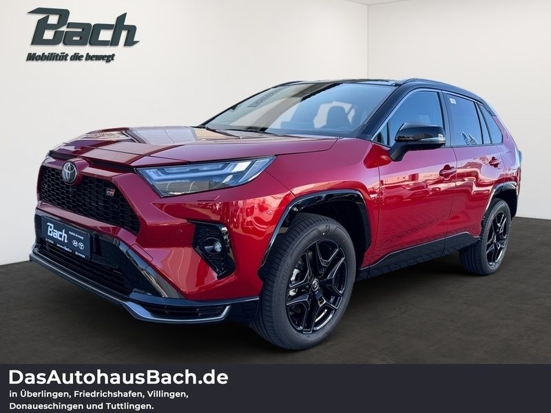 Karminarot/schwarz Gebraucht 2025 Toyota RAV4 Hybrid Sport SUV | 62.990 € - Bild 1/3
