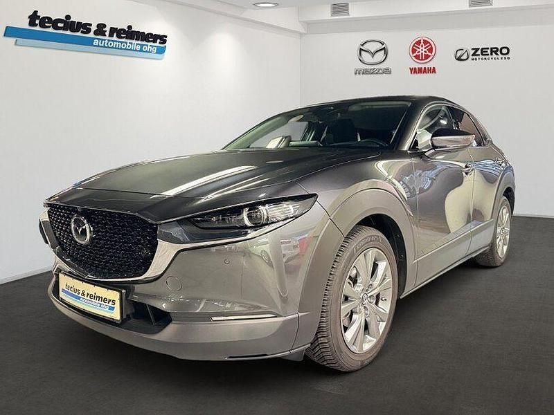 Grau Gebraucht 2025 Mazda CX-30 Exclusive SUV | 25.975 € (Superpreis) - Bild 1/3