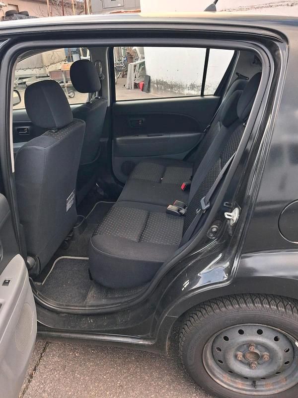 Gebraucht Daihatsu Sirion 70 PS (51 kW) 2007 Schwarz Kleinwagen
