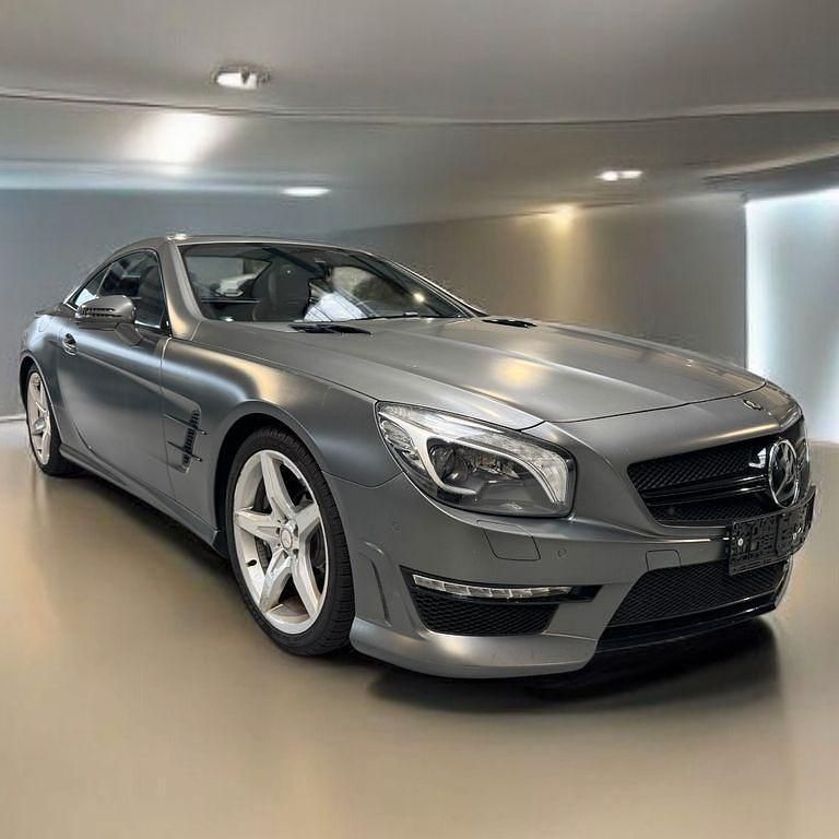 Grau Gebraucht 2012 Mercedes SL63 AMG AMG Cabrio | 69.490 € (Teuer) - Bild 1/4