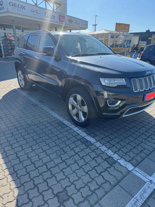 Schwarz Gebraucht 2013 Jeep Grand Cherokee SUV | 11.999 € - Bild 1/4