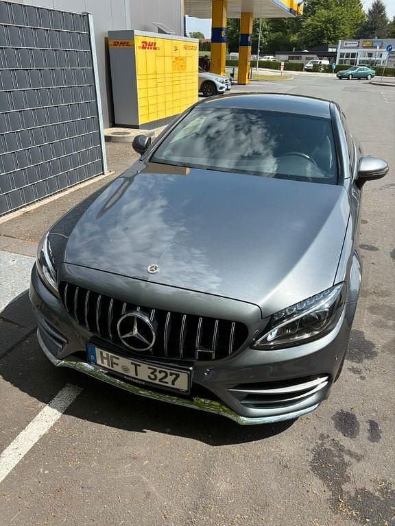 Grau Gebraucht 2016 Mercedes C180 AMG line Coupé | 19.000 € (Fairer Preis) - Bild 1/4