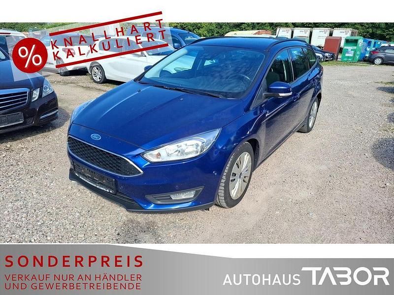 Blau Gebraucht 2017 Ford Focus Limousine | 8.285 € (Fairer Preis) - Bild 1/4