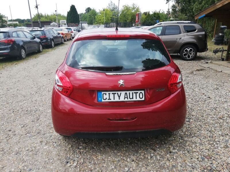 Gebraucht Peugeot 208 Access 68 PS (50 kW) 2013 Rot metallic Kleinwagen