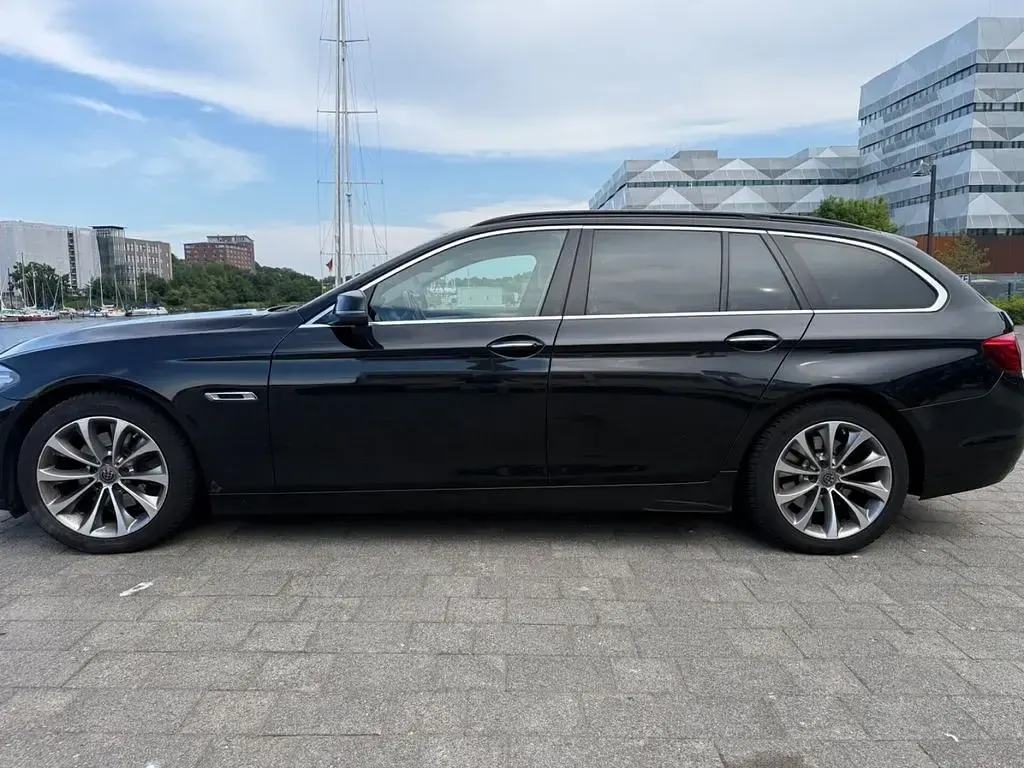 Gebraucht BMW 520 Luxury Line 184 PS (135 kW) 2014 Schwarz Kombi