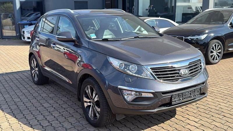 Grau Gebraucht 2013 Kia Sportage Spirit SUV | 10.999 € (Fairer Preis) - Bild 1/4