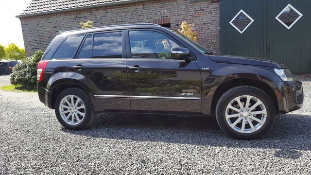 Gebraucht Suzuki Grand Vitara 129 PS (94 kW) 2013 Braun metallic SUV