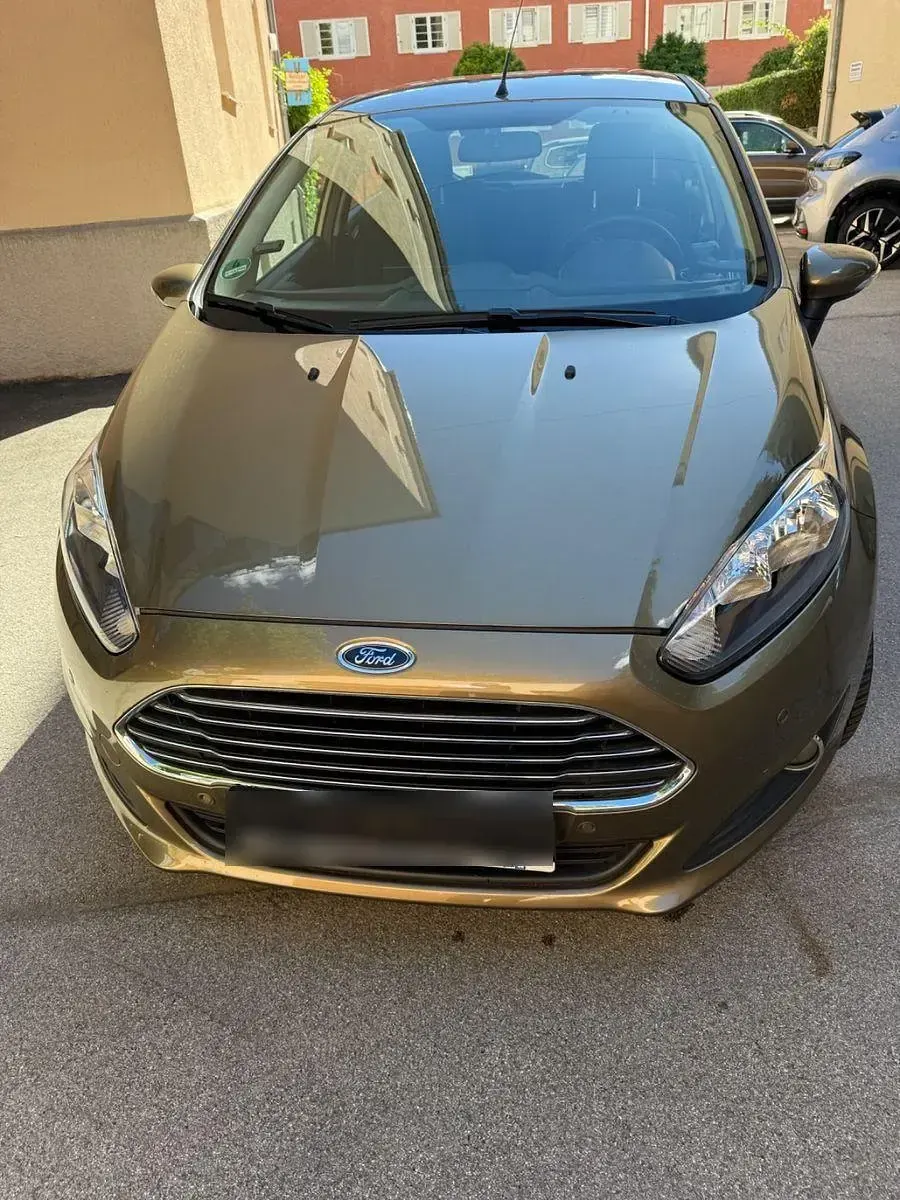 Gebraucht Ford Fiesta Trend 95 PS (69 kW) 2013 Gold Limousine