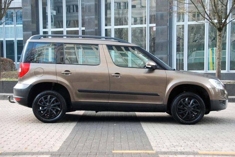 Gebraucht Skoda Yeti Ambition 105 PS (77 kW) 2011 Braun SUV