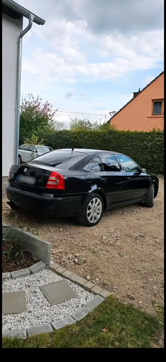 Używany Skoda Octavia 150 KM (110 kW) 2006 Czarny Sedan/Limuzyna