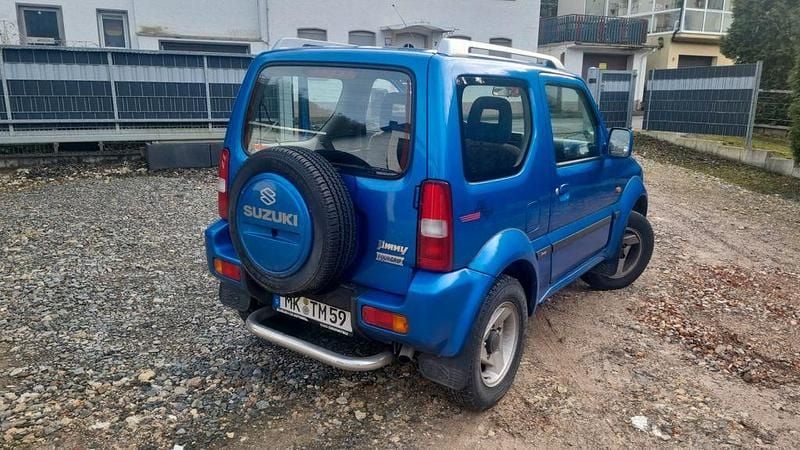 Blau Gebraucht 2003 Suzuki Jimny SUV | 5.980 € (Guter Preis) - Bild 1/4