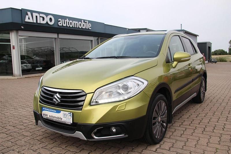 Grün Gebraucht 2013 Suzuki SX4 S-Cross Comfort+ SUV | 9.990 € (Fairer Preis) - Bild 1/4