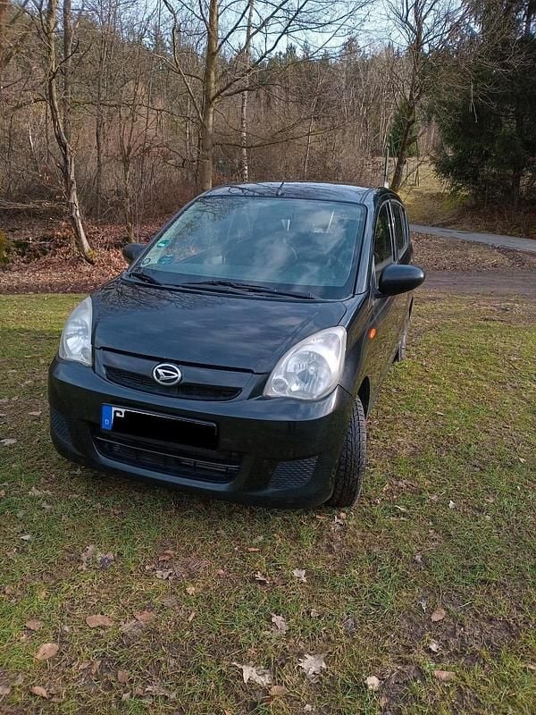 Gebraucht Daihatsu Cuore 69 PS (50 kW) 2009 Schwarz Kleinwagen