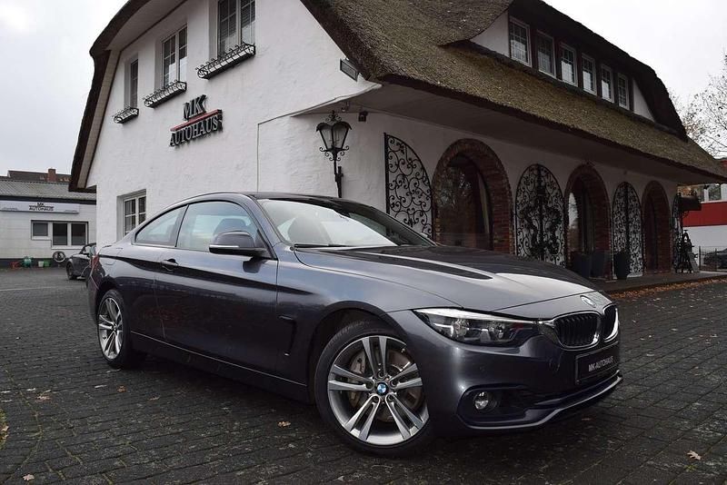 Grau Gebraucht 2018 BMW 440 Sport Line Coupé | 23.950 € - Bild 1/4