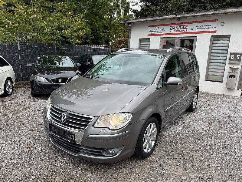 Grau Gebraucht 2009 VW Touran Highline Van / Kleinbus | 4.990 € (Fairer Preis) - Bild 1/4