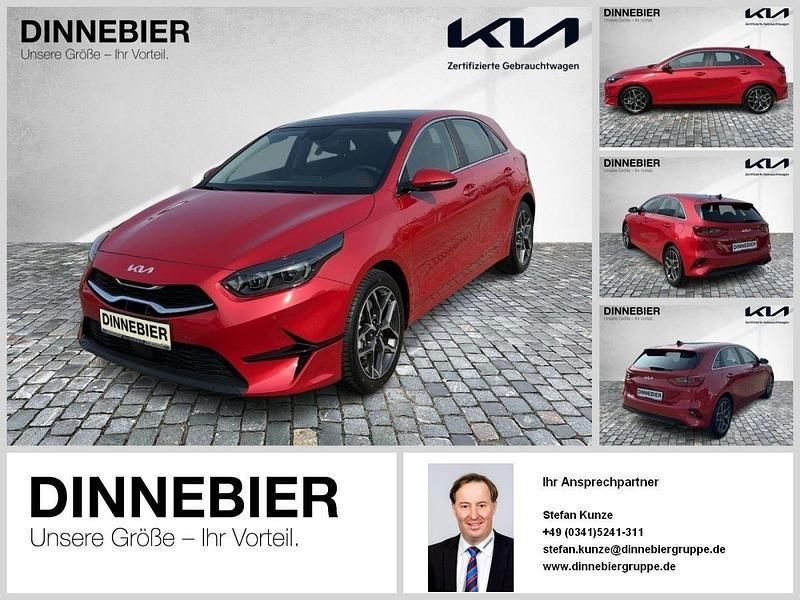 Infra red met (metallic) Gebraucht 2023 Kia Ceed Spirit Limousine | 22.699 € (Guter Preis) - Bild 1/4