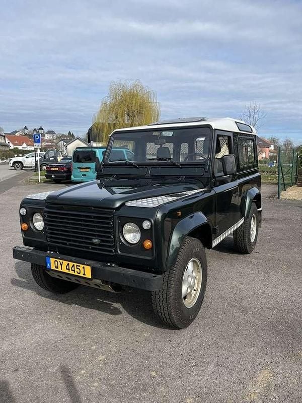 Grün Gebraucht 1997 Land Rover Defender SUV | 13.500 € (Fairer Preis) - Bild 1/4