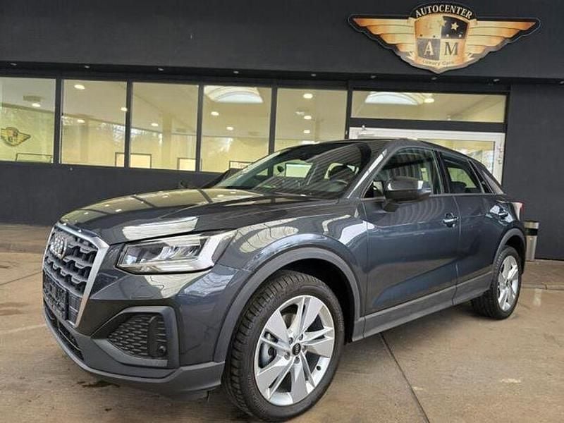 Manhattangrau metallic Gebraucht 2021 Audi Q2 Design SUV | 22.950 € (Guter Preis) - Bild 1/4