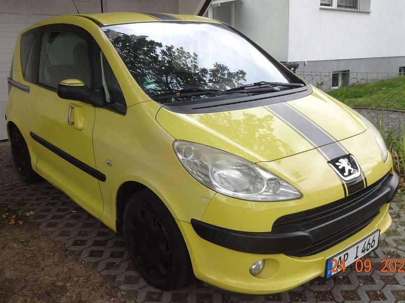 Gelb Gebraucht 2005 Peugeot 1007 Filou Kleinwagen | 1.999 € (Fairer Preis) - Bild 1/4