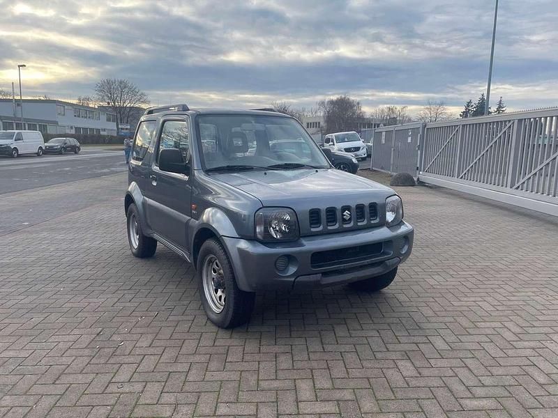 Grau Gebraucht 2005 Suzuki Jimny Ranger SUV | 6.450 € (Etwas zu teuer) - Bild 1/4
