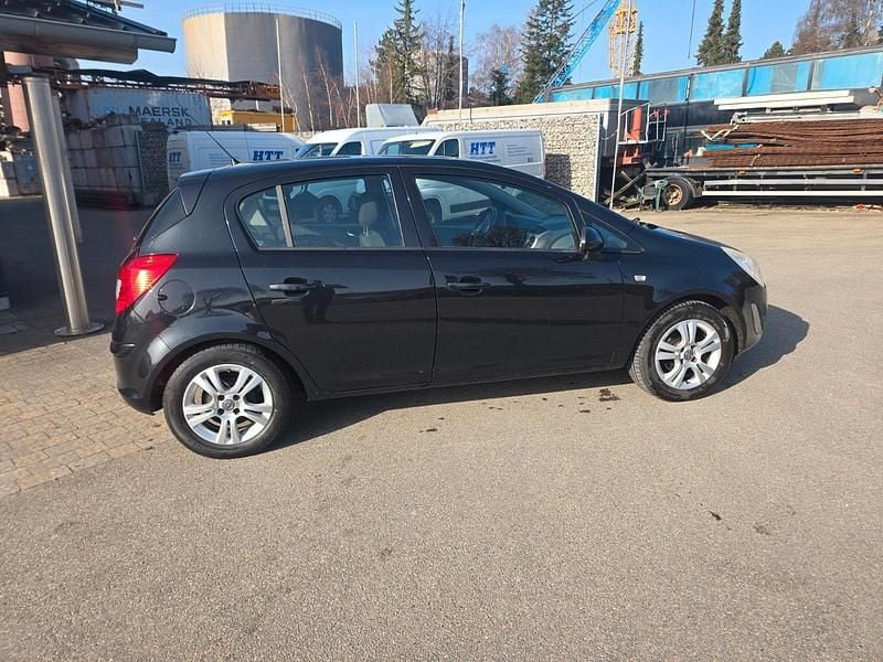 Gebraucht Opel Corsa Active 86 PS (63 kW) 2013 Schwarz Kleinwagen