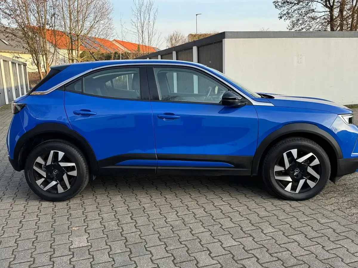 Gebraucht Opel Mokka Business Elegance 131 PS (96 kW) 2023 Perl blau/voltaik blau SUV