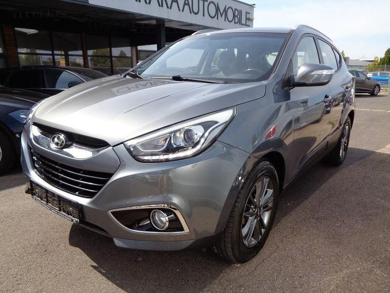 Grau Gebraucht 2015 Hyundai ix35 Finale SUV | 11.799 € (Fairer Preis) - Bild 1/4