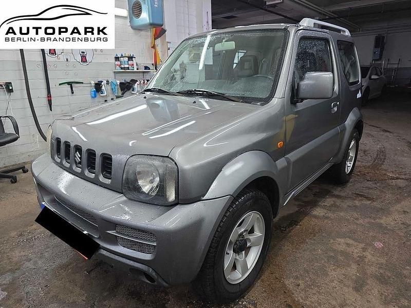 Grau Gebraucht 2006 Suzuki Jimny Style SUV | 11.490 € (Teuer) - Bild 1/4