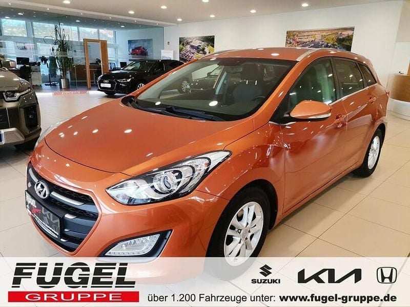 Orange caramel metallic Gebraucht 2015 Hyundai i30 Kombi | 8.995 € (Fairer Preis) - Bild 1/4