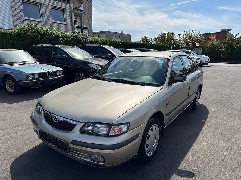 Grau Gebraucht 1999 Mazda 626 Kombi | 1.999 € (Fairer Preis) - Bild 1/4