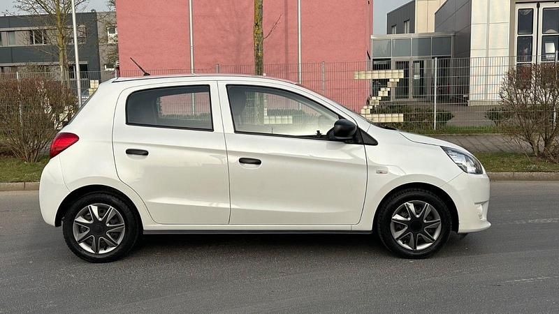 Gebraucht Mitsubishi Space Star Diamant Edition 71 PS (52 kW) 2015 Weiß Kleinwagen