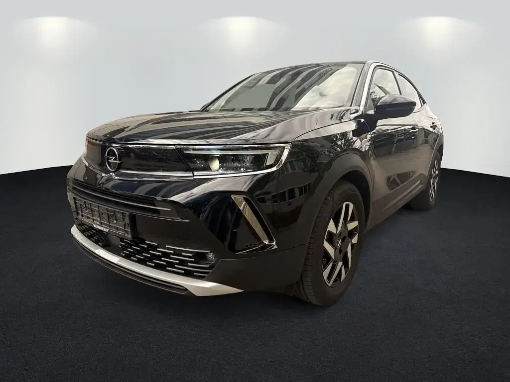 Gebraucht Opel Mokka-e Elegance 100 kW (136 PS) 2022 Diamant schwarz/karbon schwarz SUV