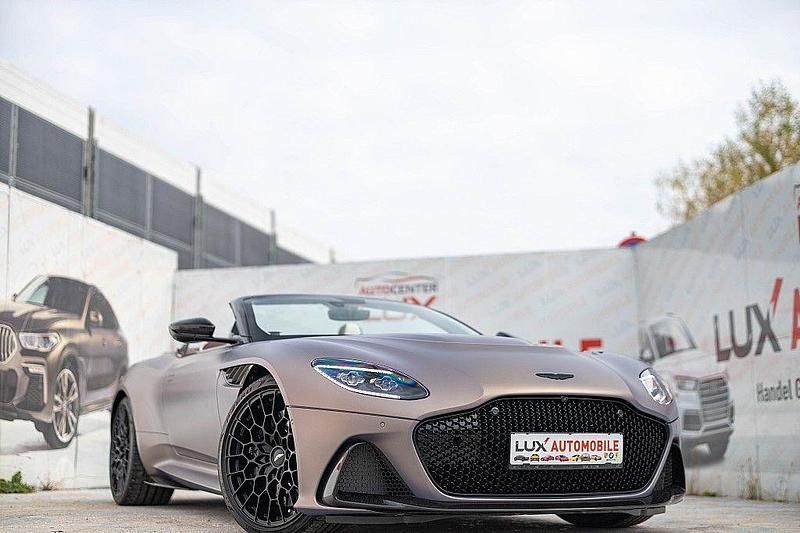 Braun Gebraucht 2024 Aston Martin DBS Cabrio | 415.740 € (Etwas zu teuer) - Bild 1/4