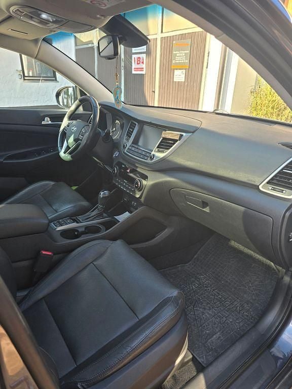 Grau Gebraucht 2016 Hyundai Tucson Style SUV | 14.900 € (Fairer Preis) - Bild 1/4