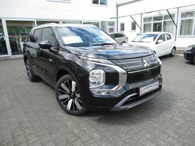Schwarz Neu 2025 Mitsubishi Outlander P-HEV Top SUV | 57.990 € (Fairer Preis) - Bild 1/4