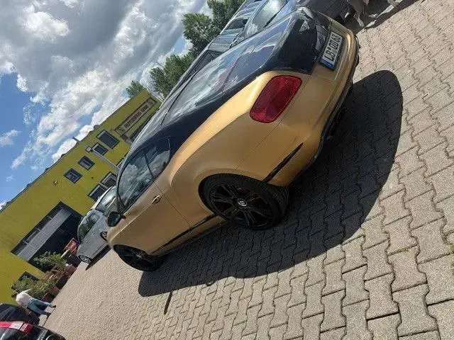 Gebraucht Bentley Continental GT 507 PS (372 kW) 2013 Gold